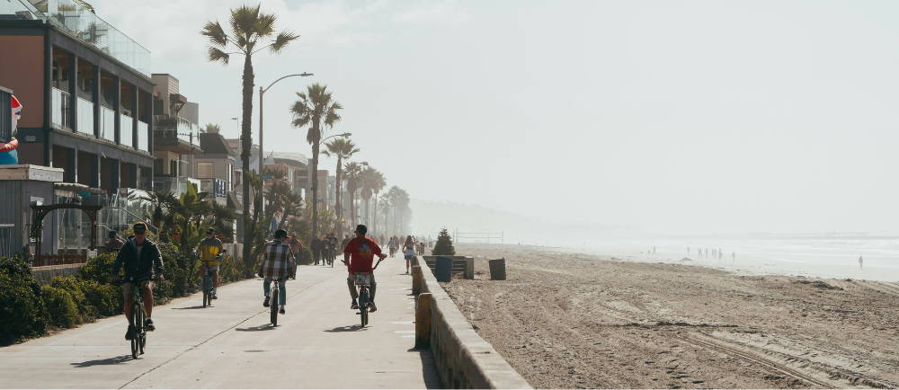 California boardwalk with cyclists and pedestrians