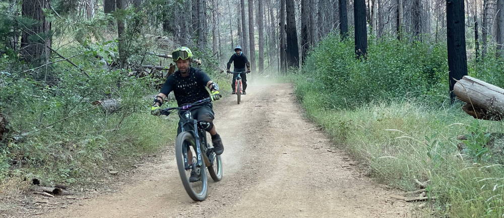 two men riding electric bikes in jerseydale, california