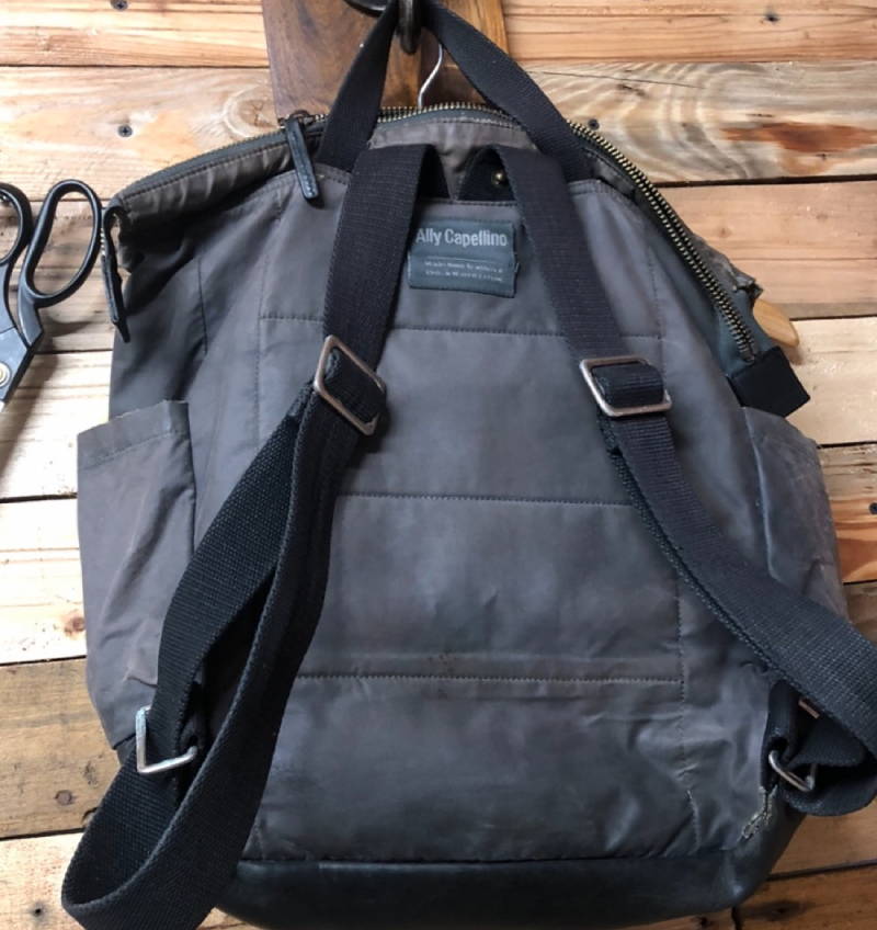 a fully wax restored fin backpack looking near-new