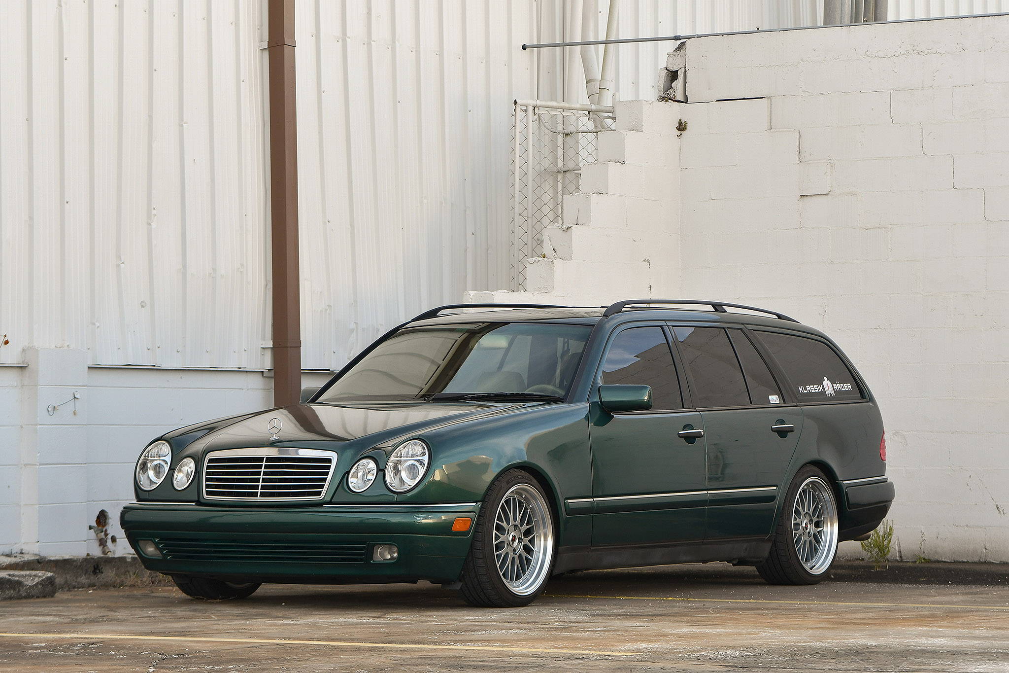 green mercedes E class wagon on gunmetal machined klassik rader pro trak wheels