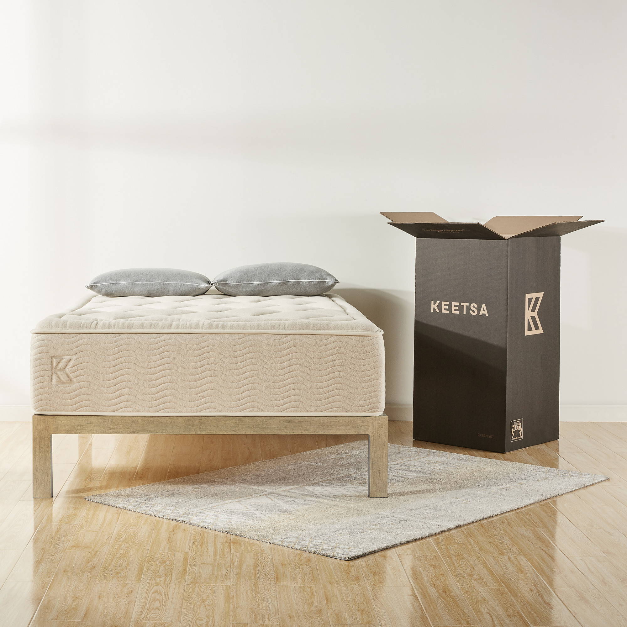 The Keetsa Pillow Plus Mattress in bedroom.