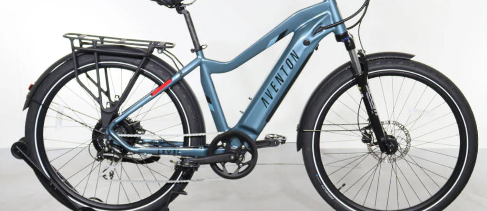 a light blue Aventon Level.2 electric commuter bike
