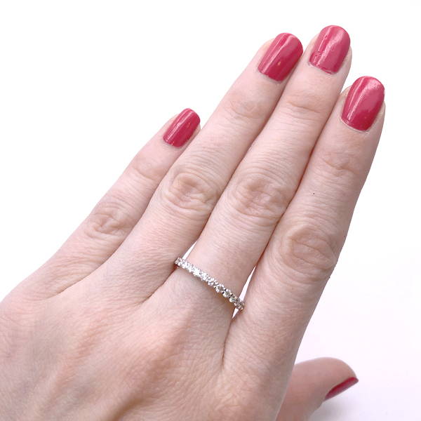 thin engagement ring with diamonds all around