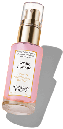 bottle of pink drink firming resurfacing essence