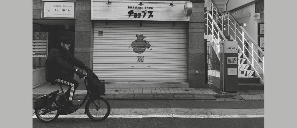 Bike rider on the street in Tokyo