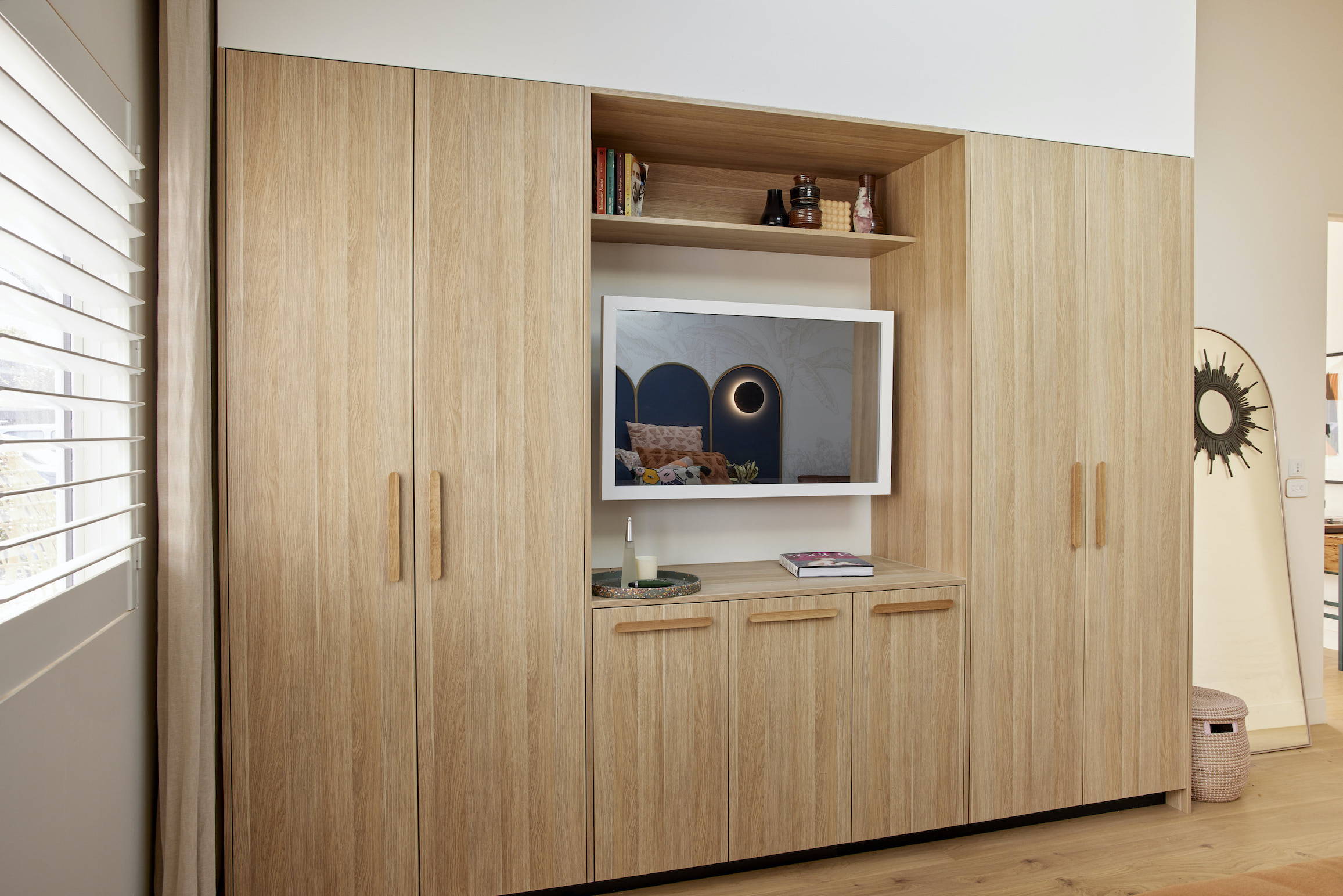 TV-Mirror Modern Matte White Frame by FRAMING TO A T - A square white frame on a TV-Mirror inset into oak cabinetry
