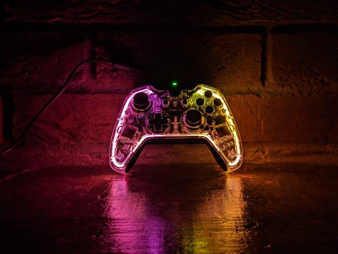 bigbig won rainbow rgb controller looks bright beside a brick wall