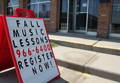 Sidewalk sign advertising music lessons outside of South Windsor School of Music. 