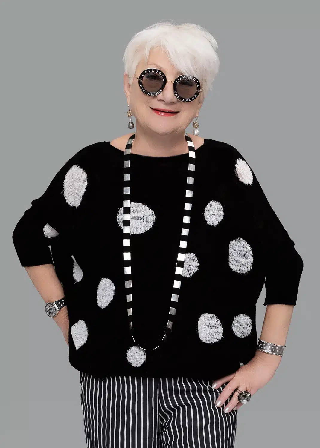 Ellen Wille wearing cool sunglasses and a polka dot sweater