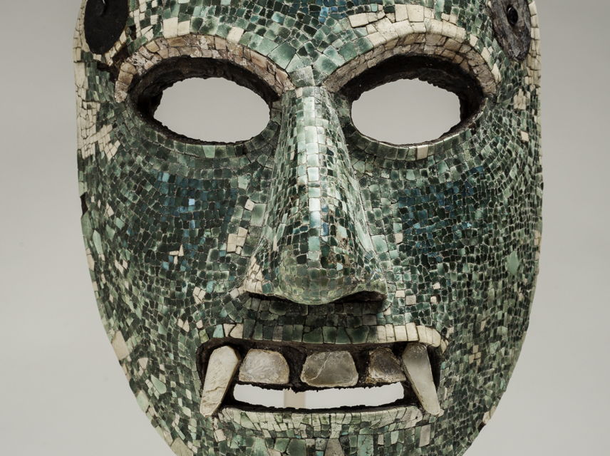 Image:  Mask  Mixtec, 1321-1421 CE  Wood, turquoise, and mother-of-pearl  h. 6 in. (15.2 cm); w. 5 in. (12.7 cm); d. 3 1/2 in. (8.9 cm)  Bequest of Elizabeth Huth Coates, 97.1.18