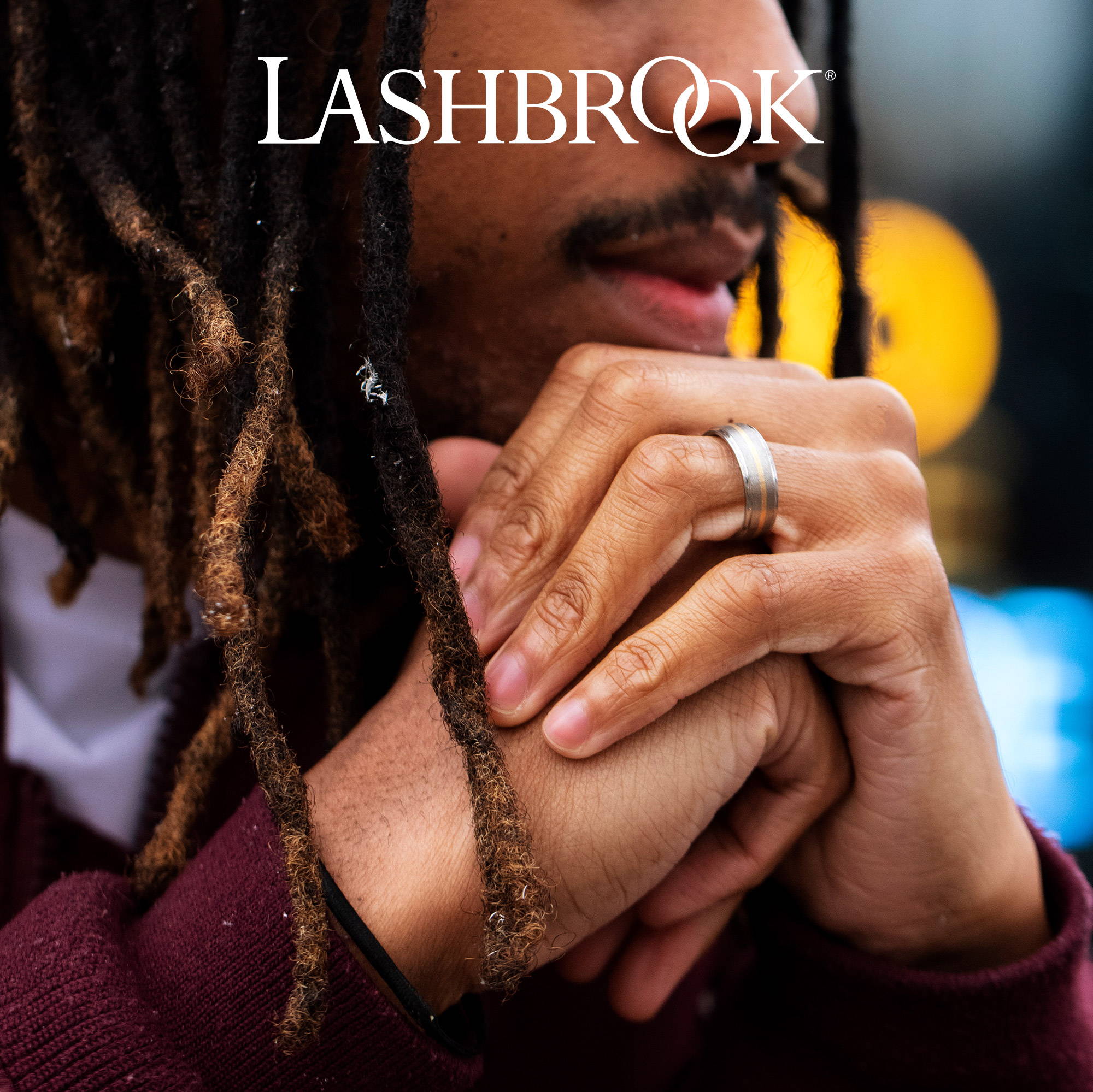 Model wearing a Lashbrook wedding band.