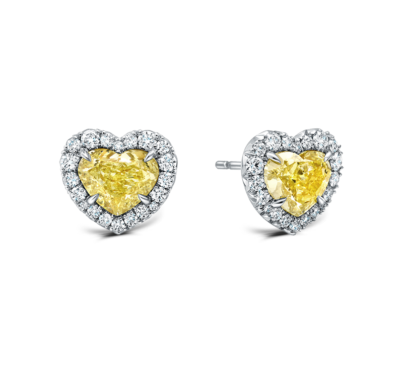 Heart shaped yellow diamond earrings with white diamond halos