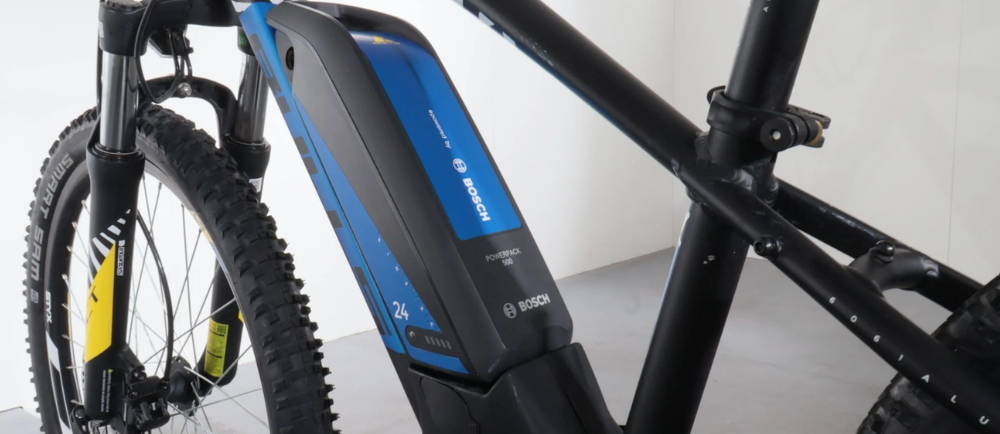 the diamond frame and battery on a Bulls Twenty4 E Zebra electric mountain bike for younger riders
