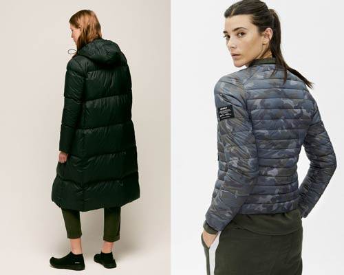 Woman wearing long insulated coat from Ecoalf made from recycled polyester and woman wearing sustainable insulated bomber jacket in blue camouflage