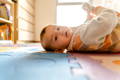Baby on a mat.