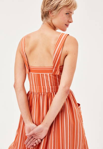 Back of women's striped organic cotton dress in Orange