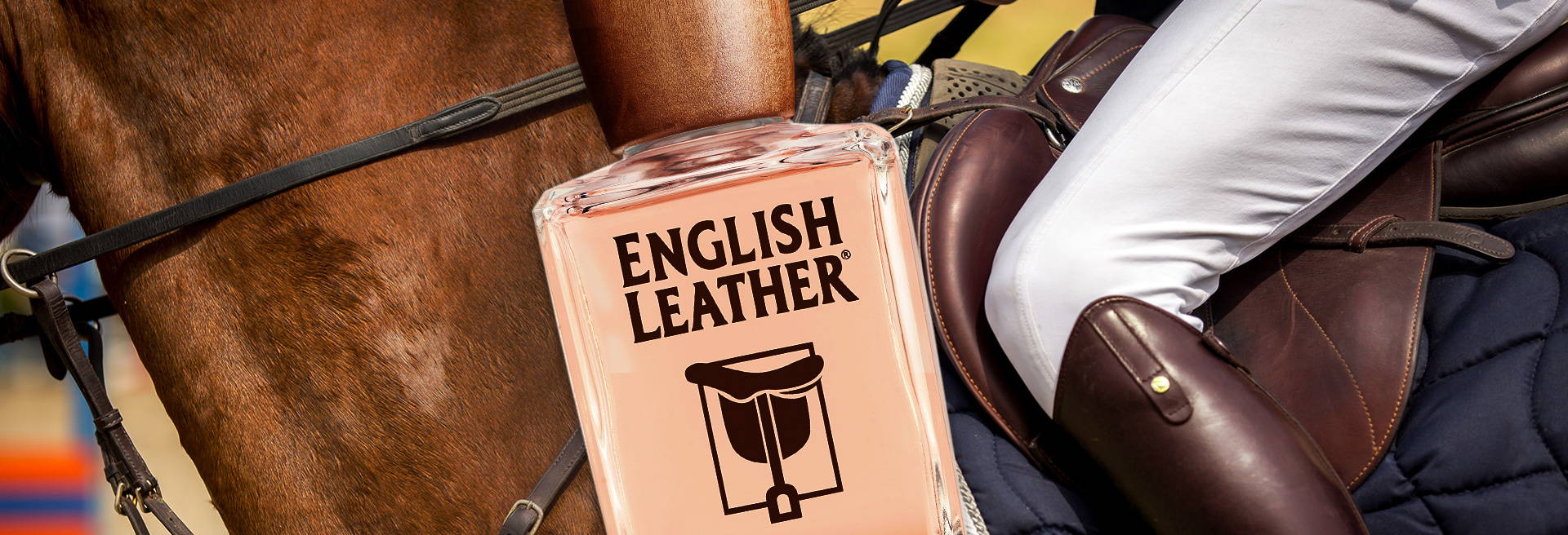 Bottle of English Leather eau de toilette on background of horse saddle and equestrian riding his horse with leather boots