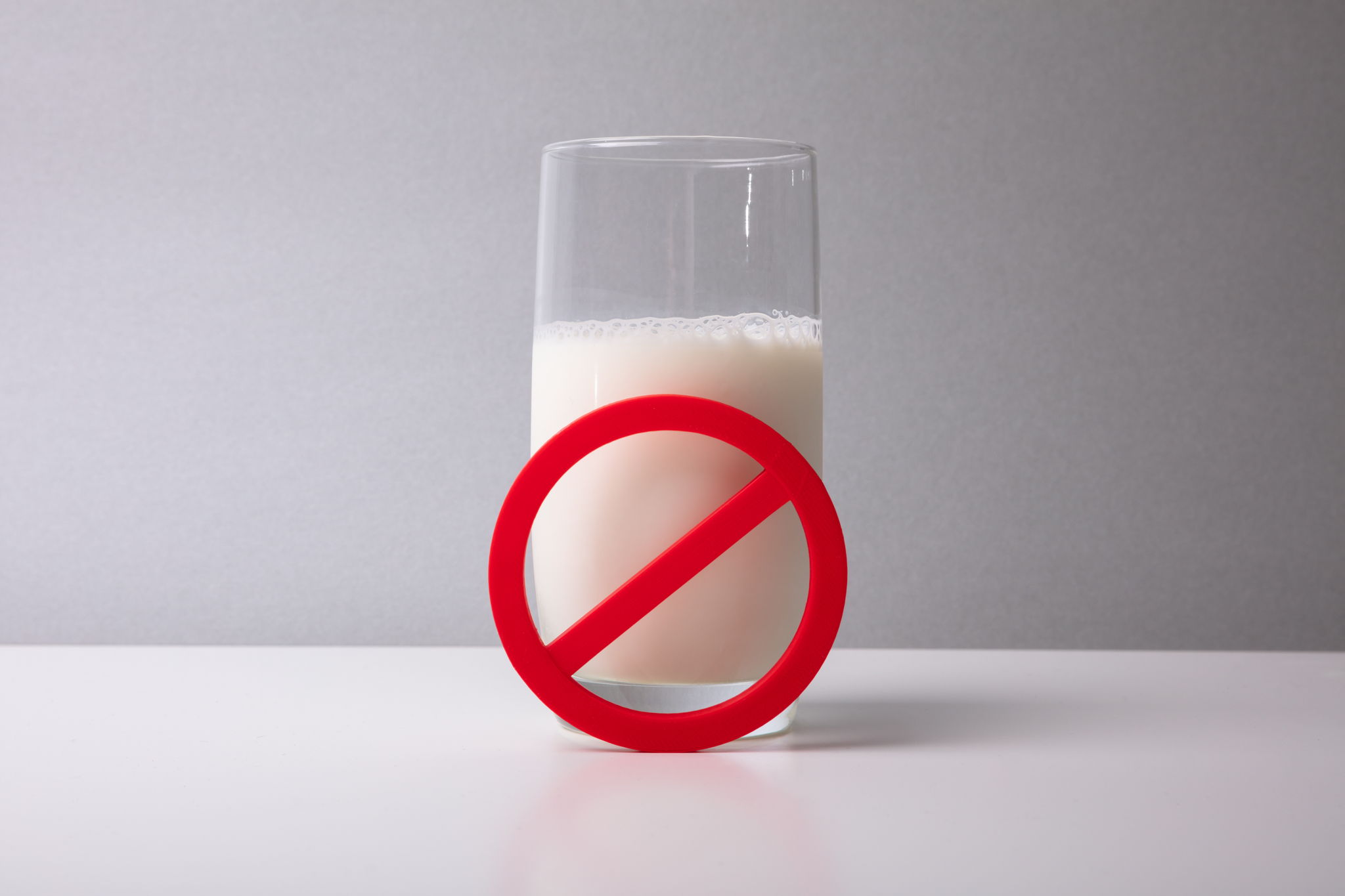 Red No Sign In Front Of Milk Glass