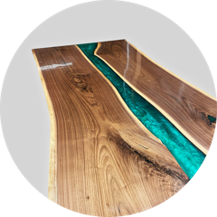 Walnut river table with blue green epoxy