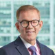 Fidelity Investments is paying 2,000 employees to hasten their corporate exits, including high-profile RIA overseer, Sanjiv Mirchandani, as part of its shift to a digital future