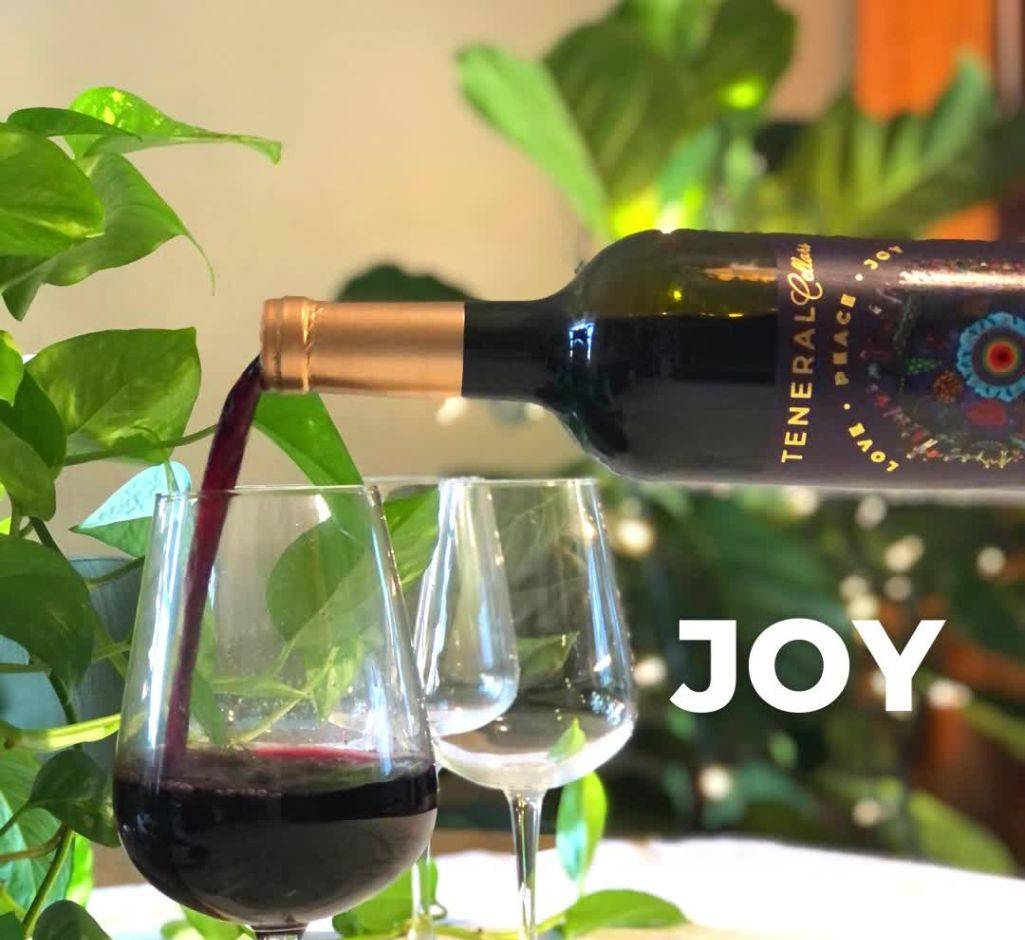 Bottle of Teneral Cellars Red Wine being poured into wine glass