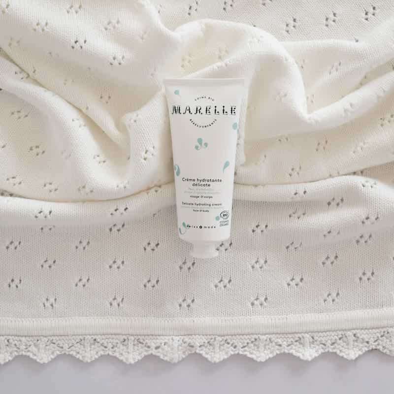 Bonnet 100% laine tricoté en Suisse Joli Nous, confort et qualité premium pour bébé, fabriqué en Suisse