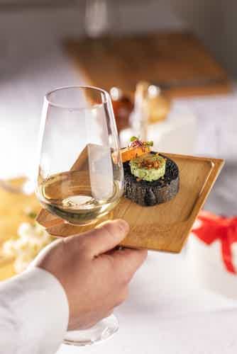 Sip sparkling wine with canapés onboard