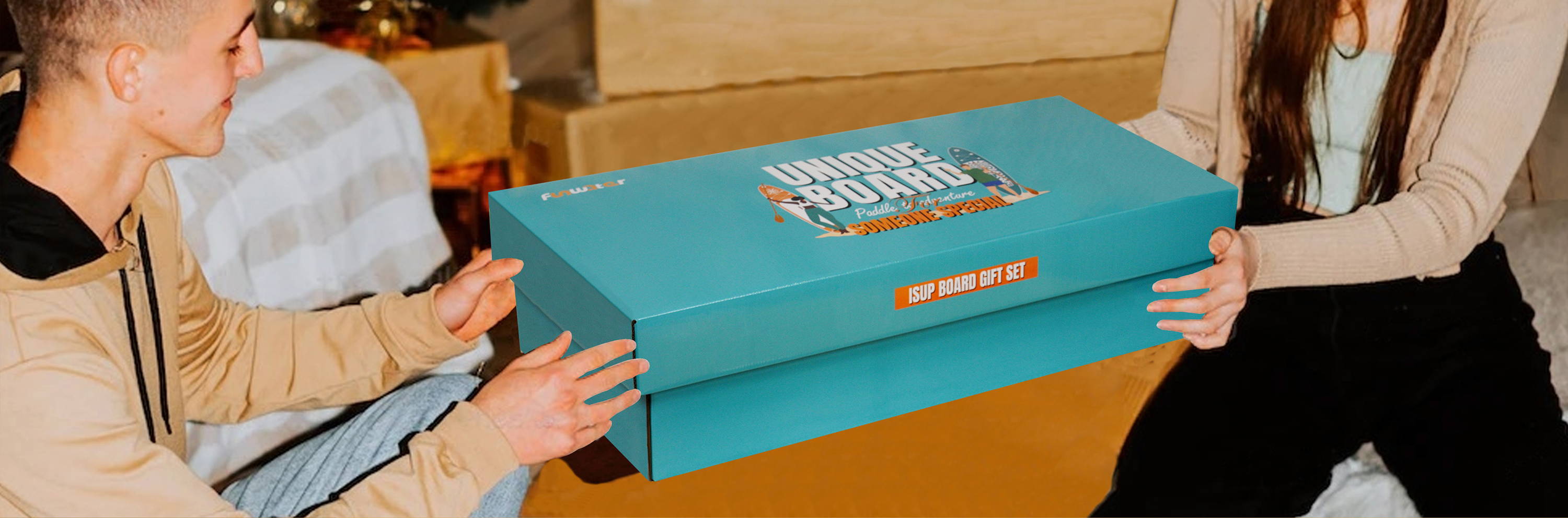 A couple prepares to open this blue paddle board gift box