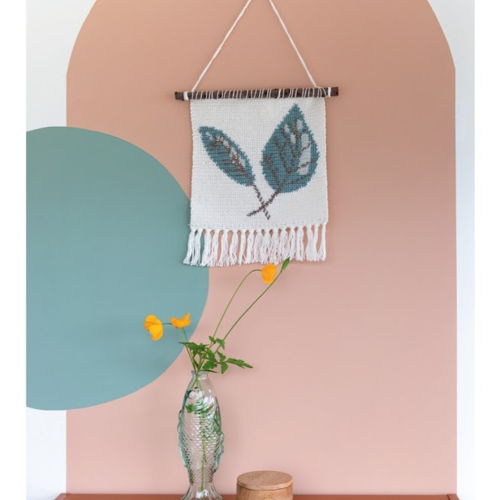 Wall hanging with leaves
