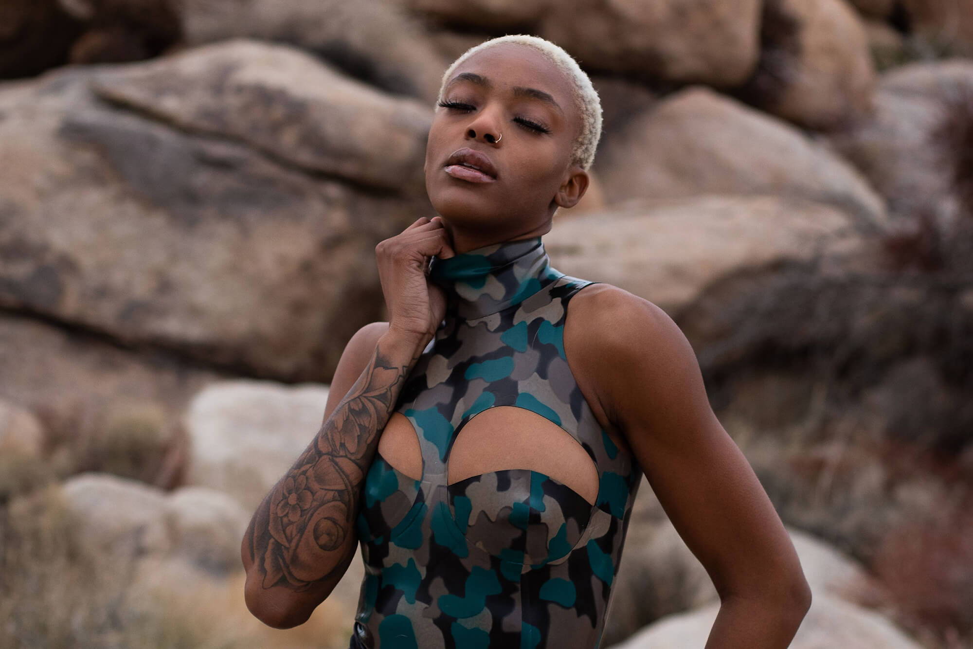 Model Wearing A Vex Latex Glitter Dress