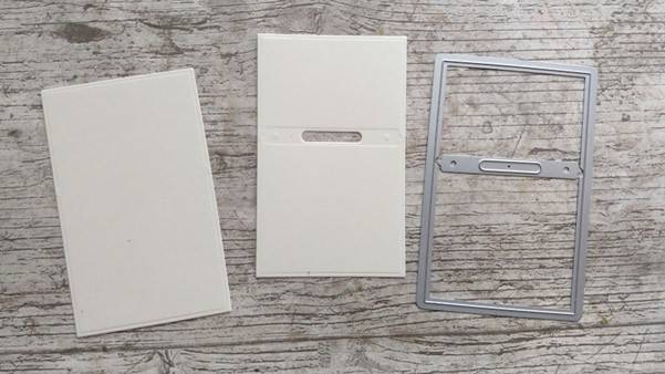 a white rectangular object with a metal frame