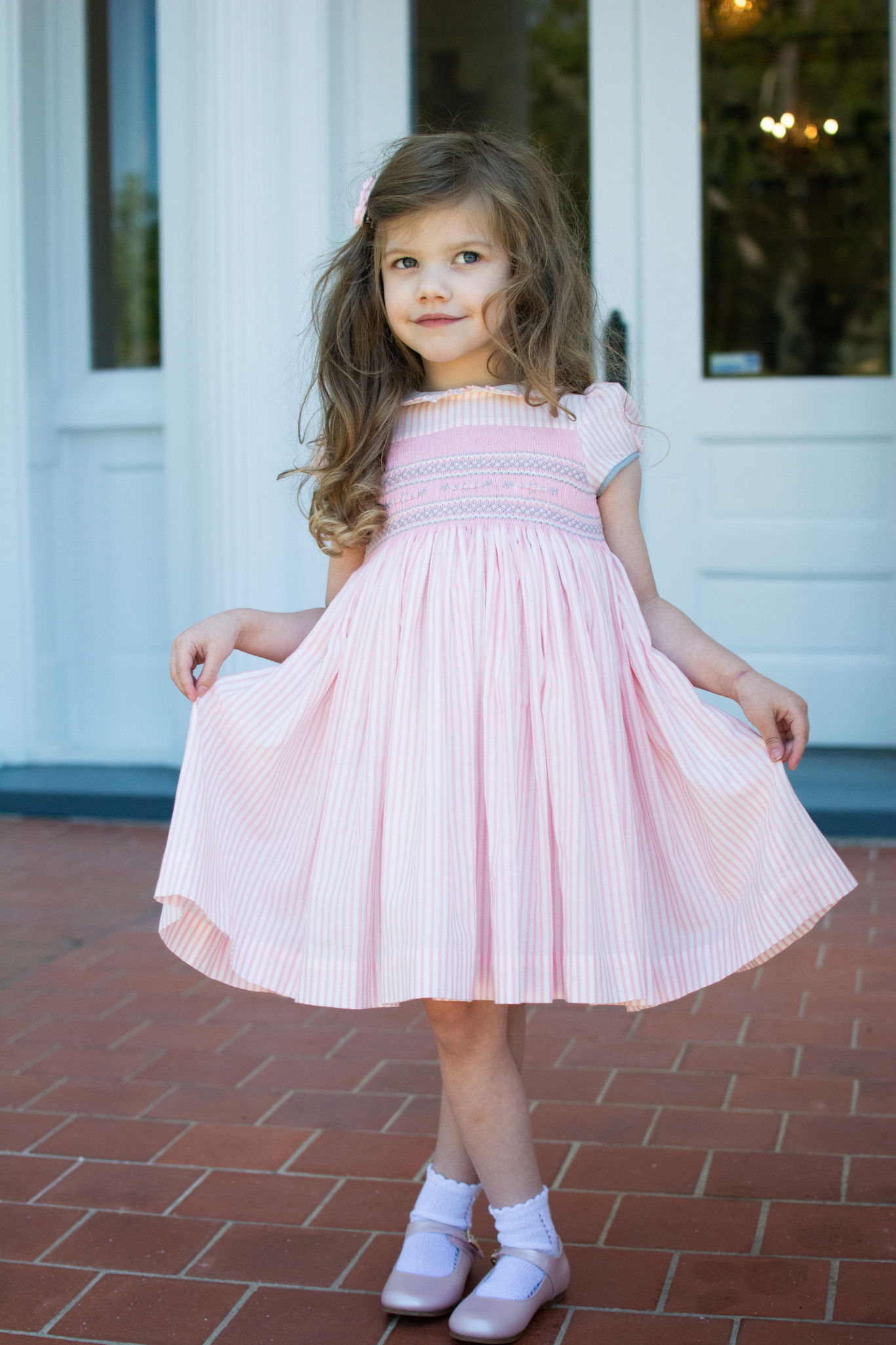 Pink striped smocked dress