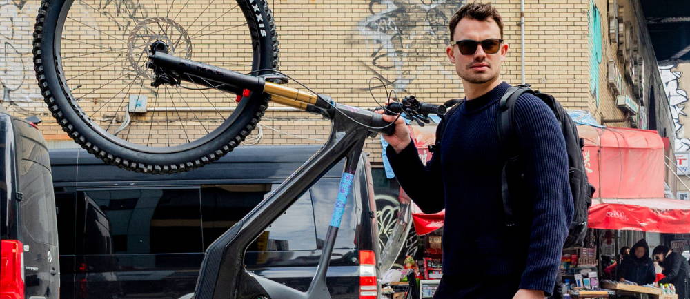 Male holding his ebike upright for some reason