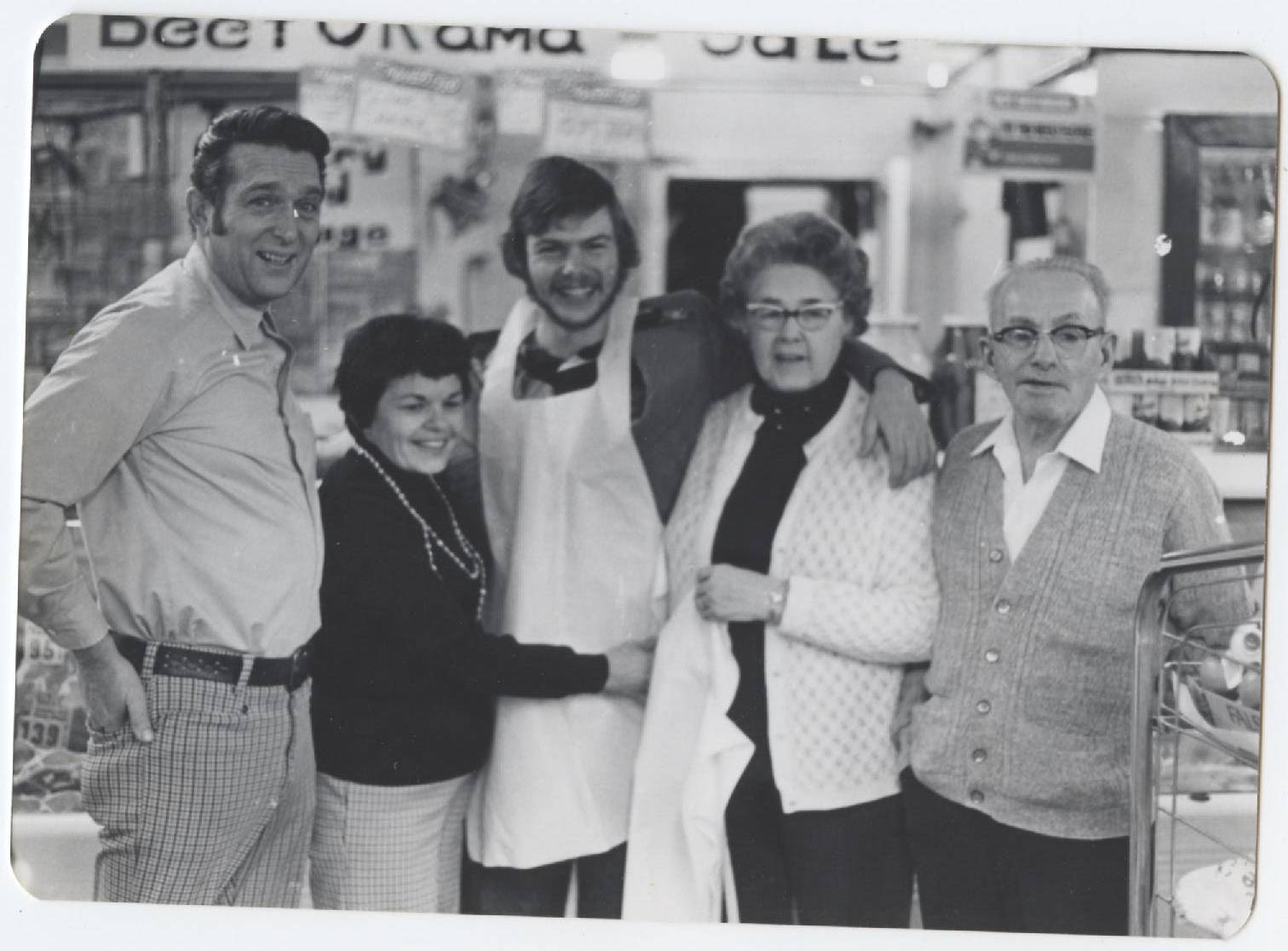 Family photo of my great grandparents, grandparents and father passing down the grocery store Appleton's Market from one generation to the next 