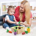 Little girl and her mother playing with the Montessori Vegetable Set. 
