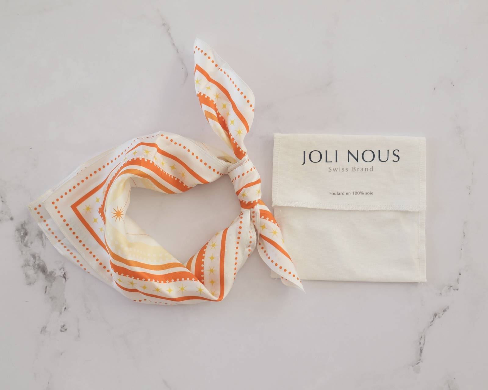 collaboration solidaire suisse terre des hommes joli nous foulard 100% soie douce élégant 100% bénéfices reversés