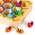 Montessori Bee Box wooden game for children with colorful little bees. 