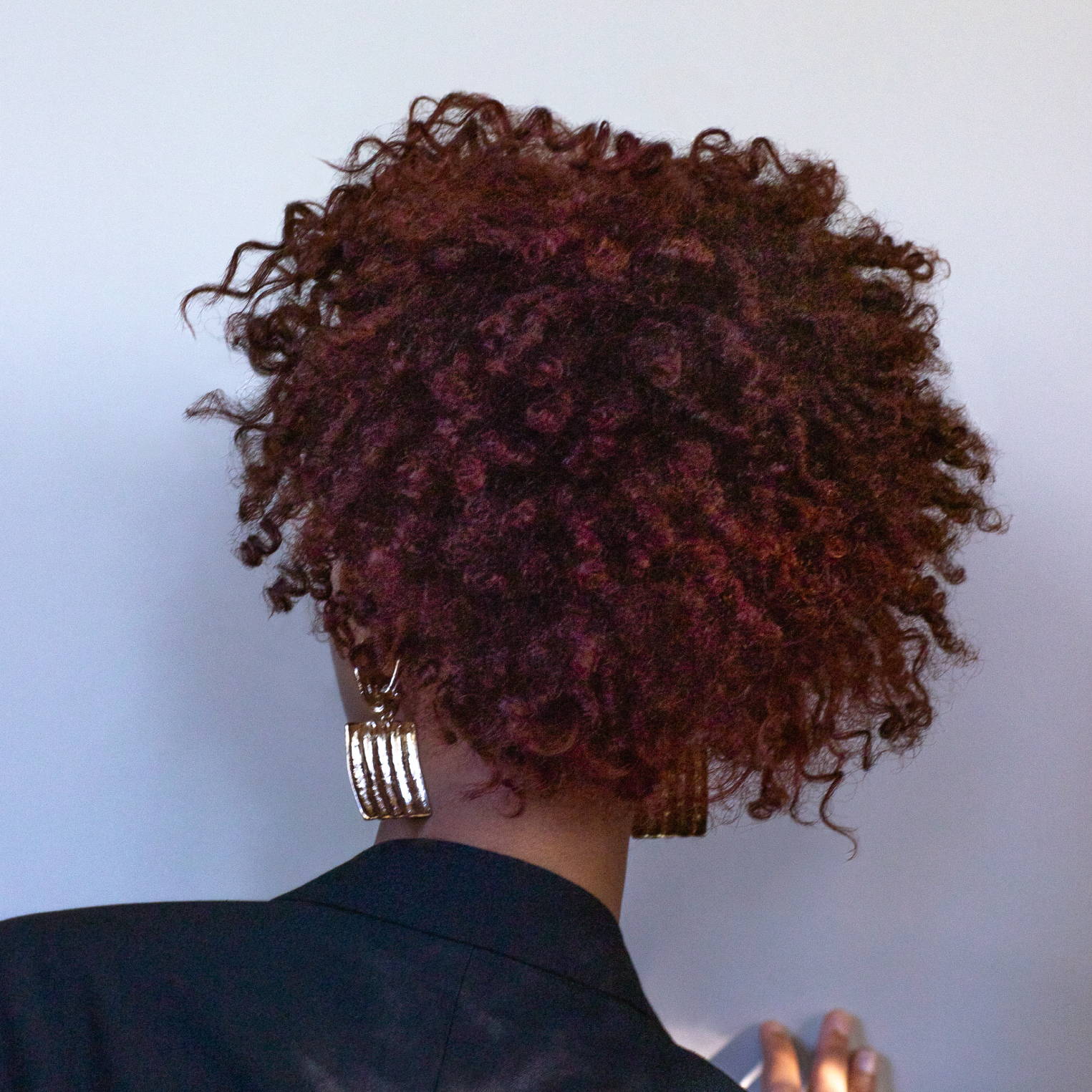 Davines hair model with auburn afro