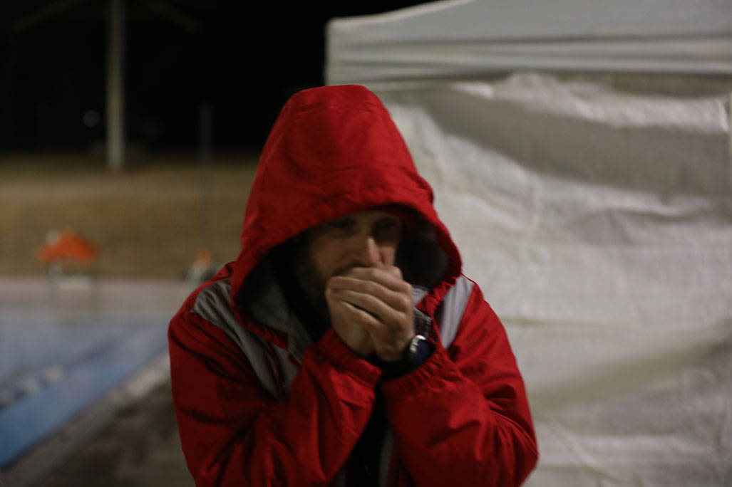 James Lawrence blowing in hands