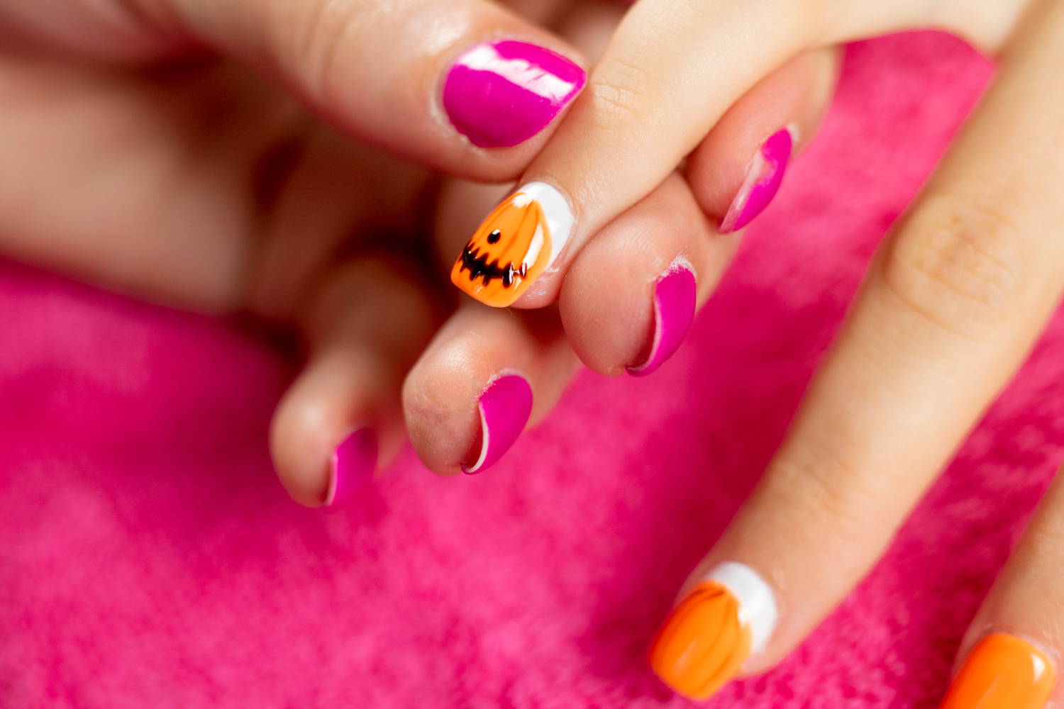 Pumpkin nails detailing added to nail using a dotting tool and ORLY Liquid Vinyl