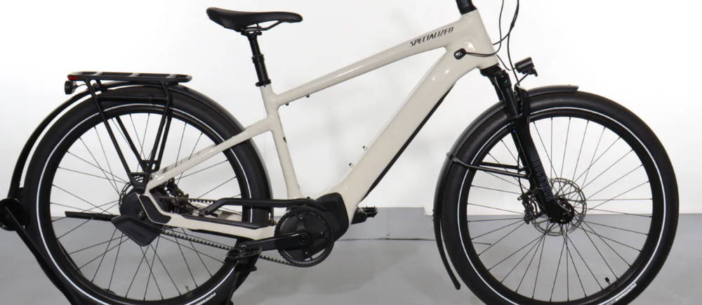 a white Specialized Turbo Vado 5.0 front suspension electic bike