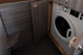 Storyteller GXV Epic Washer/Dryer in Cabin Bedroom - Climate Control All-Season Adventures