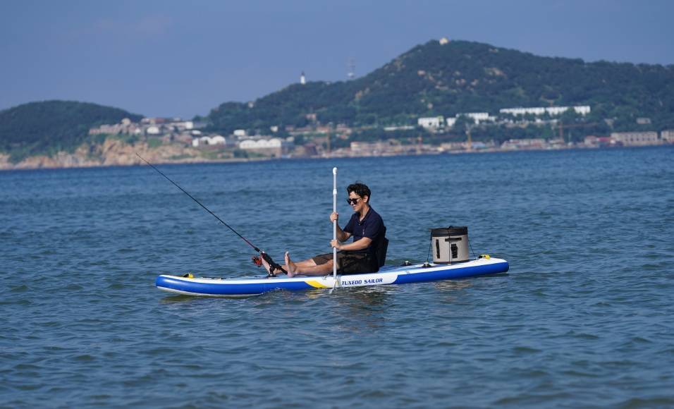 Funwater SUP paddle board for fishing can support fishing equitment in calm lakle