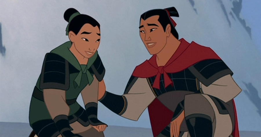 Image of Shang talking to Mulan while they wear their uniform. Shang is consoling Mulan and they are both smiling.