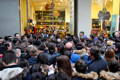 People lining up outside shop for black friday sale