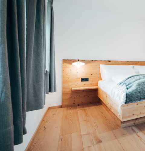 Ferienwohnung Tannheimer Tal mit gemütlichem Schlafzimmer in den Bergen
