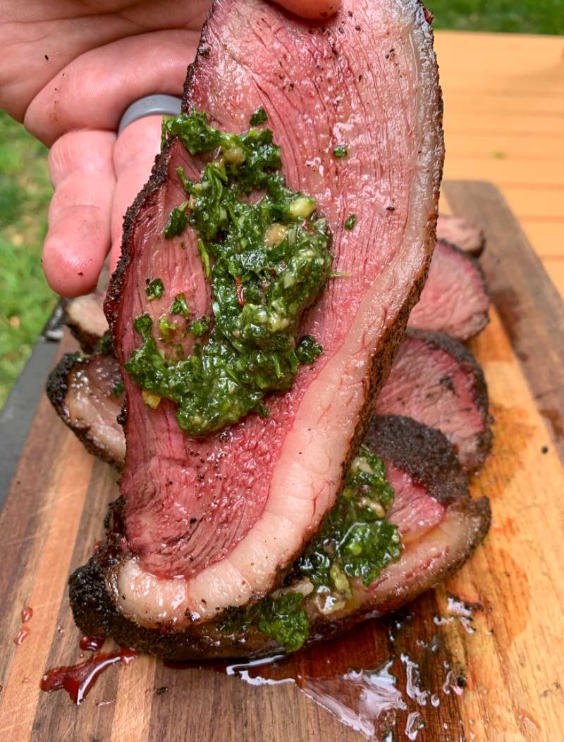 BetterFed Beef Certified ONYA® Picanha served with a bone marrow chimichurri sauce. When slicing a picanha, first slice with the grain so you are then able to slice against the grain for each bite. 