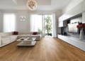 TImber Flooring with curtains and red charir and fireplace
