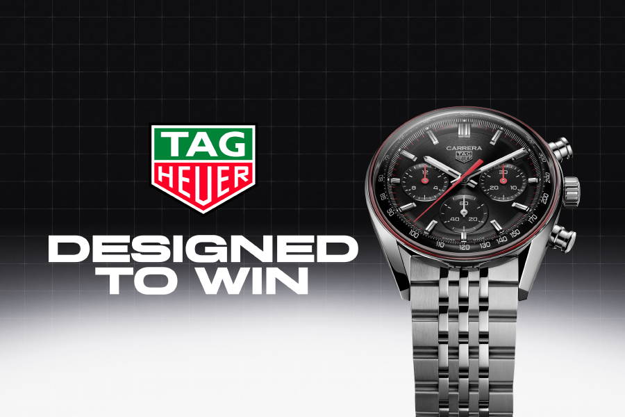 Tag Heuer watch with 'Designed to Win' text on a black background