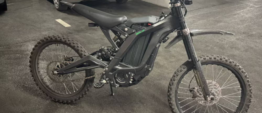 Electric dirt bike in garage